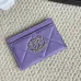 Chanel card holder with chain detail. #B45527