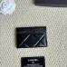 Chanel card holder with chain detail. #B45527