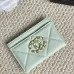 Chanel card holder with chain detail. #B45527