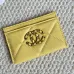 Chanel card holder with chain detail. #B45527