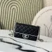 Chanel Mini flap bag, Lambskin & gold-tone metal, white & black  #B49255