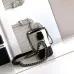 Chanel Women's Bucket Bag - Black & White Quilted Leather, Gold-Tone CC Logo & Two-Tone Chain Strap, Stylish Crossbody Bag for Luxury Fashion #B56725