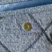 Chanel Women's Denim Tote Bag - Quilted Design, Light Blue Denim Fabric, Gold-Tone CC Logo & Chain Strap with Lock Detail, Spacious Luxury Handbag with Functional Pockets #B56722