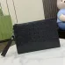 Rubber-effect small pouch in black leather #B50315