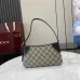 GG Emblem small shoulder bag in coated fabric #B49564