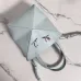 Loewe Women's Mini Bucket Bag - Light Blue Leather with Penguin Embroidery, Convertible Handle & Crossbody Strap, Playful Luxury Handbag with Anagram Logo #B56831