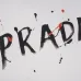 Prada T - Shirt With Artistic Splatter Logo And Sleeve Accents Black/White #B54244