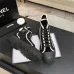 Chanel Women’s High-Top Boots – Black Suede with White Stitching & CC Logo Toe Cap #A69905