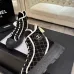 Chanel Women’s High-Top Boots – Black Suede with White Stitching & CC Logo Toe Cap #A69905