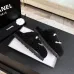 Chanel Women’s Black Fuzzy Slippers with White CC Logo, Soft Shearling Interior, Platform Sole #A69880
