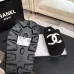 Chanel Women’s Black Fuzzy Slippers with White CC Logo, Soft Shearling Interior, Platform Sole #A69880