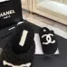 Chanel Women’s Black Fuzzy Slippers with White CC Logo, Soft Shearling Interior, Platform Sole #A69880