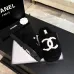 Chanel Women’s Black Fuzzy Slippers with White CC Logo, Soft Shearling Interior, Platform Sole #A69880