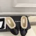 Chanel Women’s Black Leather Slippers with Cream Shearling Lining & Gold-Tone CC Bow Detail #A69899
