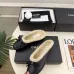 Chanel Women’s Black Leather Slippers with Cream Shearling Lining & Gold-Tone CC Bow Detail #A69899