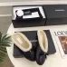 Chanel Women’s Black Leather Slippers with Cream Shearling Lining & Gold-Tone CC Bow Detail #A69899