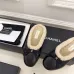 Chanel Women’s Black Leather Slippers with Cream Shearling Lining & Gold-Tone CC Bow Detail #A69899