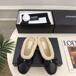 Chanel Women’s Black Leather Slippers with Cream Shearling Lining & Gold-Tone CC Bow Detail #A69899