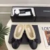 Chanel Women’s Black Leather Slippers with Cream Shearling Lining & Gold-Tone CC Bow Detail #A69899
