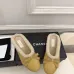 Chanel Women’s Black Leather Slippers with Cream Shearling Lining & Gold-Tone CC Bow Detail #A69900