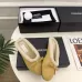 Chanel Women’s Black Leather Slippers with Cream Shearling Lining & Gold-Tone CC Bow Detail #A69900