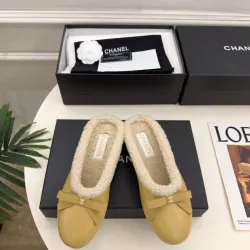 Chanel Women’s Black Leather Slippers with Cream Shearling Lining & Gold-Tone CC Bow Detail #A69900