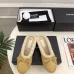 Chanel Women’s Black Leather Slippers with Cream Shearling Lining & Gold-Tone CC Bow Detail #A69900