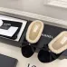 Chanel Women’s Black Velvet Slippers with Cream Shearling Lining & Gold-Tone CC Bow Detail #A69901