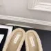 Chanel Women’s Black Velvet Slippers with Cream Shearling Lining & Gold-Tone CC Bow Detail #A69901