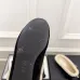 Chanel Women’s Black Velvet Slippers with Cream Shearling Lining & Gold-Tone CC Bow Detail #A69901