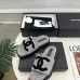 Chanel Women’s Gray Fuzzy Slippers with Black CC Logo, Soft Shearling Sole, Flat Slide Design #A69891