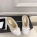 Chanel Women’s White Sheepskin Slippers with Bow Detail & CC Logo #A69898