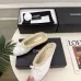 Chanel Women’s White Sheepskin Slippers with Bow Detail & CC Logo #A69898