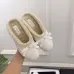 Chanel Women’s White Sheepskin Slippers with Bow Detail & CC Logo #A69898