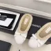 Chanel Women’s White Sheepskin Slippers with Bow Detail & CC Logo #A69898