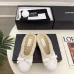 Chanel Women’s White Sheepskin Slippers with Bow Detail & CC Logo #A69898