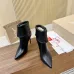 Christian Louboutin Black Leather Ankle Boots with Pointed Toe, 100mm Stiletto Heel & Red Sole #A69801