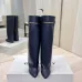 Givenchy Women’s Navy Leather Knee-High Boots with Gold Strap & Pointed Toe #A69810