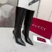 Gucci Women’s Black Leather Knee-High Boots with Pointed Toe & Gold Stiletto Heel #A69820