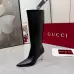 Gucci Women’s Black Leather Knee-High Boots with Pointed Toe & Gold Stiletto Heel #A69820