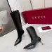 Gucci Women’s Black Leather Knee-High Boots with Pointed Toe & Gold Stiletto Heel #A69820