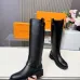 Louis Vuitton Black Women’s Knee-High Boots with Gold Buckle Strap & Pull Tabs #A69871