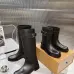 Louis Vuitton Women’s Black Leather Knee Boots with Adjustable Strap and Low Block Heel #A69828