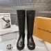 Louis Vuitton Women’s Black Leather Knee Boots with Adjustable Strap and Low Block Heel #A69828