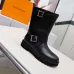 Louis Vuitton Women’s Black Leather Mid-Calf Boots with Adjustable Buckle Straps and Chunky Tread Sole #A69872