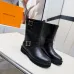 Louis Vuitton Women’s Black Leather Mid-Calf Boots with Adjustable Buckle Straps and Chunky Tread Sole #A69872
