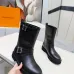 Louis Vuitton Women’s Black Leather Mid-Calf Boots with Adjustable Buckle Straps and Chunky Tread Sole #A69872