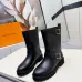 Louis Vuitton Women’s Black Leather Mid-Calf Boots with Adjustable Buckle Straps and Chunky Tread Sole #A69872