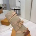 Louis Vuitton Women’s Suede Knee Boots with Cross-Strap Buckle Detail, Beige with Red Trim #A69918