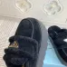 Prada Women's Shearling Lined Mule Slippers Triangle Logo Thick Sole Design for Cozy Luxury Winter Footwear #B57748